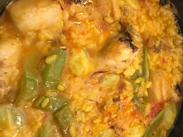 Soupy rice with chicken, ribs and vegetables